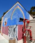 'Keeping the culture going': Inside the restoration of a heartfelt mural at the Watts Towers in Los Angeles