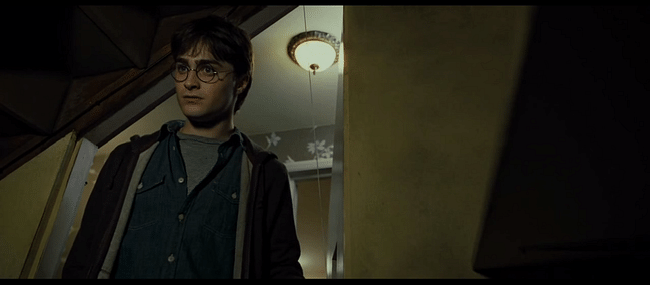 An older Harry bids goodbye to the cupboard under the stairs in the 7th movie, 'Harry Potter and the Deathly Hallows'. Screenshot via youtube