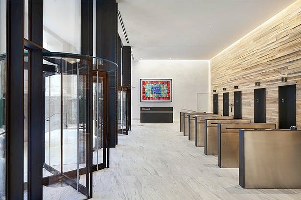View of stone Lobby & wooden turnstile 