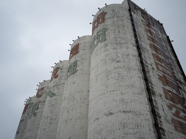 The towering cylindrical silos