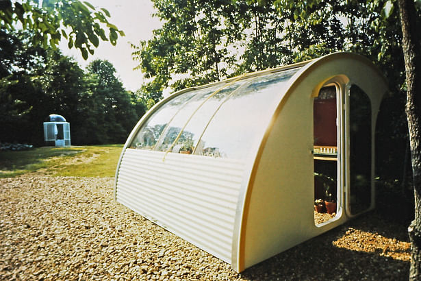 Solar heated insulated greenhouse open day position1974.