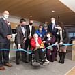 Ribbon cutting at Jefferson House, Hitchcock Unit are, from the top left: Eric Smullen, senior vice president of Hartford HealthCare Community Network; Jeffery Palmer of C.E. Floyd; Myles Brown of Amenta Emma Architects; Marie Penn, RN of Jefferson House; Sarah Shannon, RN of Jefferson House; Mike Daglio, executive vice president and chief operating officer of Hartford HealthCare; and Lisa Connolly, vice president of Hartford HealthCare Community Network. From the bottom left are Maria Lopez...