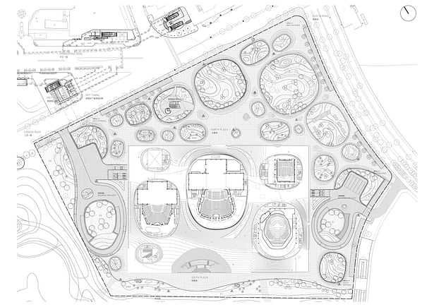 The floor plan shows the structure of the building: an open public space arranged around six 'bubbles' and an open air amphitheatre. The four performance halls are accompanied by foyers, entrances and services access points.