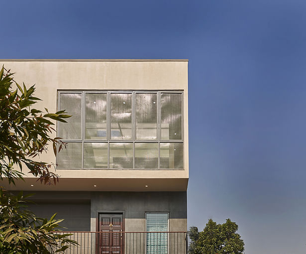 Play of light on the perforated shutters. 