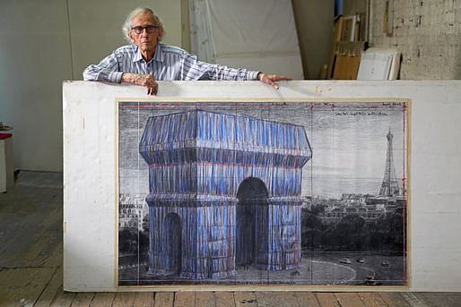 Christo in his studio with a preparatory drawing for 'L'Arc de Triomphe, Wrapped,' New York City, September 20, 2019. Photo: Wolfgang Volz © 2020 Christo and Jeanne-Claude Foundation
