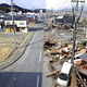 This combination of pictures shows the view of a tsunami hit area of Ofunato, Iwate prefecture on March 14, 2011 (right side) and the same scene as it appears on January 15, 2012 (left side). March 11, 2012 will mark the first anniversary of the massive tsunami that pummeled Japan. (Toshifumi Kitamura/AFP/Getty Images) 