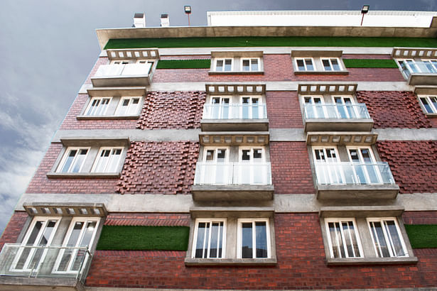 Brick and concrete Facade