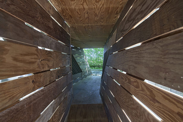 view inside the gate bridge pavilion with the beautiful wood patterns_seen from the monastery garden, © René de Wit