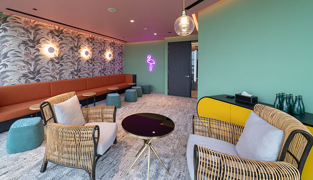 Each meeting area serves as an artistic exposition, organising the entire workspace informally by design themes (e.g. tropical chic, in this instance) and offering an eclectic palette of ideas for employees. The spaces were designed as places to evoke inspiration and stoke the imagination.