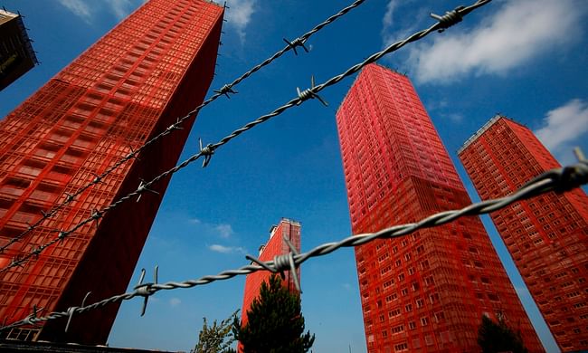 Glasgow’s Red Road flats. Hailed as the solution to slums, they came to represent the failings of 20th-century high-rise housing. Photograph: Murdo MacLeod/Guardian. Image via theguardian.com.