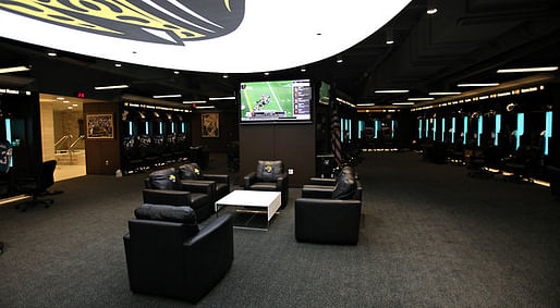 the Jaguars’ locker room at EverBank Field, with wide leather chairs and 80-inch television by Daron Dean for The New York Times