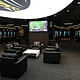the Jaguars’ locker room at EverBank Field, with wide leather chairs and 80-inch television by Daron Dean for The New York Times