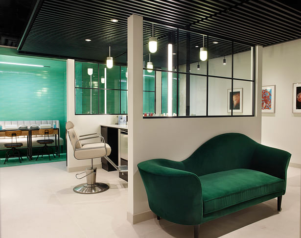 A simple yet elegant palette of green, off-white and black features in the treatment areas