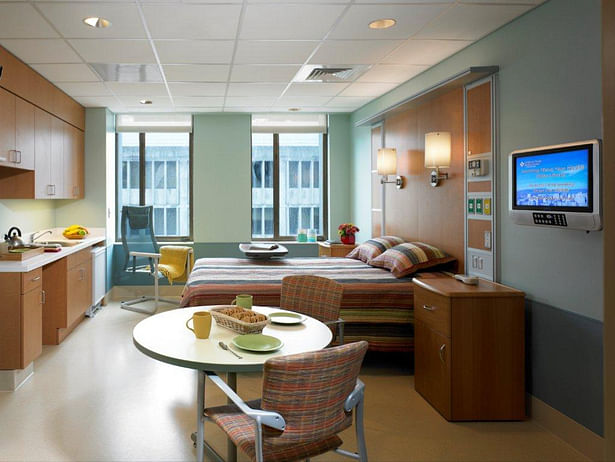 Transition 'apartment' style patient room with ADL kitchen in room.