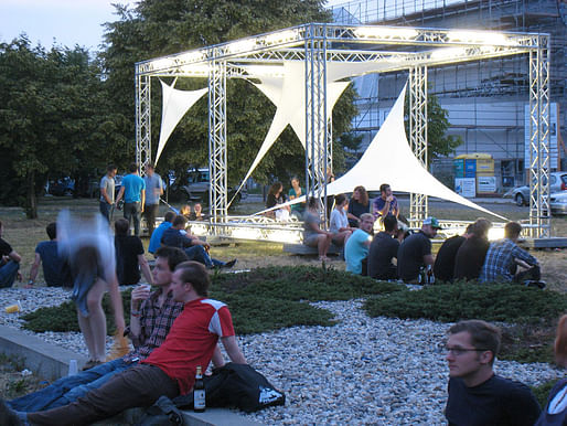 Students at Brandenburg University of Technology during the opening night of the completed sculpture