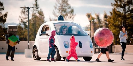 One of Google's driverless cars brakes for Halloweeners. Image via popularmechanics.com.