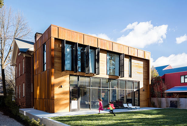 Old meets new and leaves room for a backyard on a compact lot. 