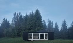 This 40m2 wilderness cabin by Ark Shelter Studio offers a cozy glamping experience