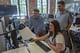 Jon Marcoux (second from left), director of Clemson’s graduate programs in historic preservation, works with students in the Clemson Design Center of Charleston.