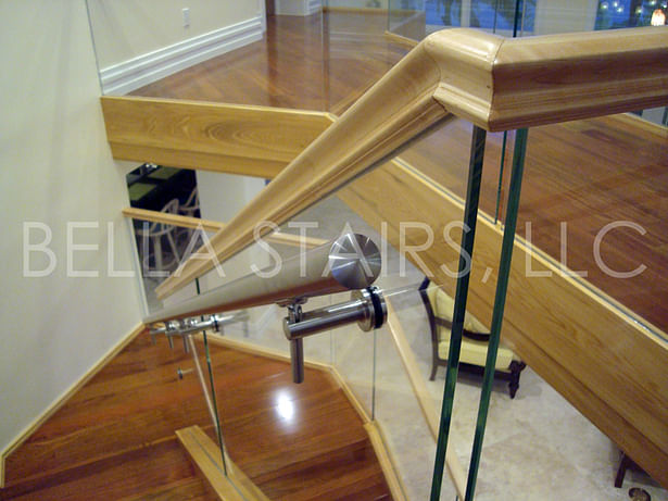 The stainless steel handrails were mounted directly onto the glass panels.