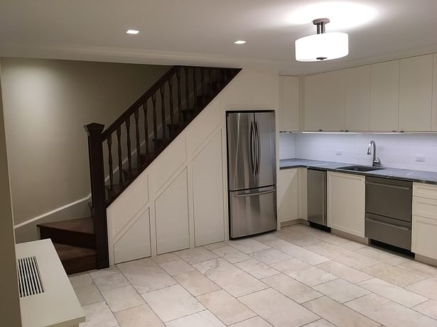 Cellar gut renovation with new kitchen and stair to match upper floors