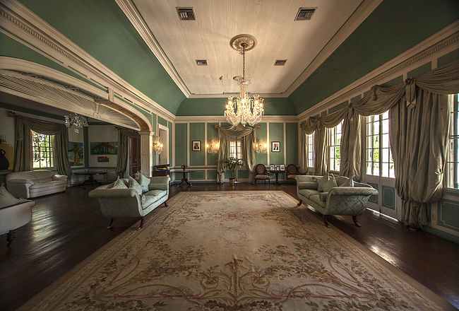 Government House, in St. John's, Antigua and Barbuda. View of a drawing room located on the ground floor of the main building and facing out on the deep front porch, 2015. Photo: Philip Logan