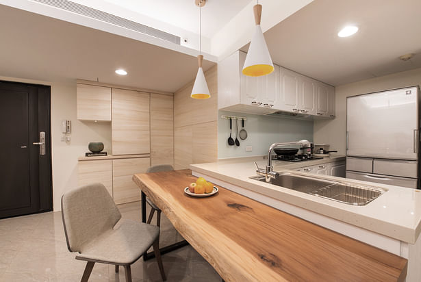 Dining table with customized cabinetry in foyer