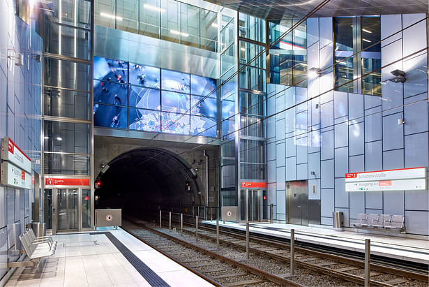 Track level Schadowstraße Metro Station with video installation screen