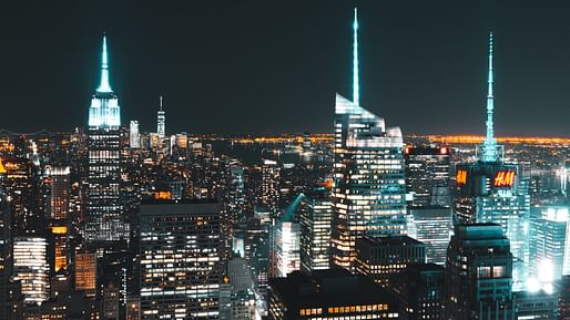 View of the Manhattan skyline at night. Image courtesy of Wikimedia user Kai Pilger