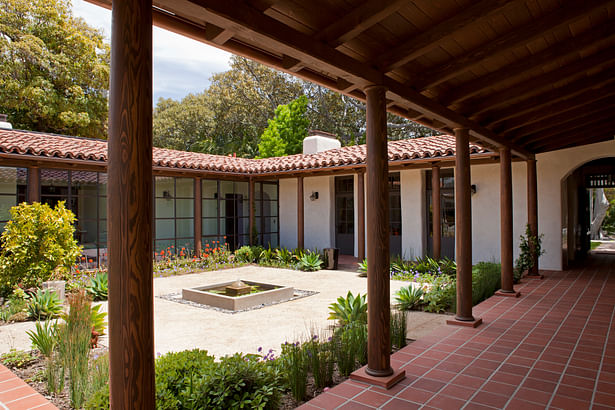 The courtyard was created with a central fountain, a decomposed granite surface and native plants.