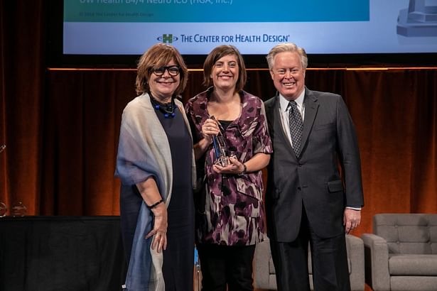 Jenny Hastings (center) and Eric Rasmussen accept the Touchstone Award from Rosalyn Cama (left) on behalf of the Center for Health Design for Boulder Associates work at Sutter Medical Foundation Roseville Oncology Center.