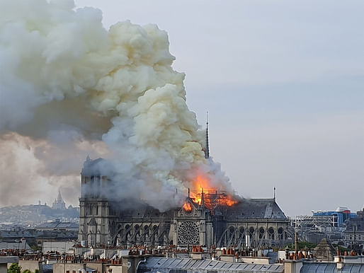 The 96-meter/315-ft-tall spire of Notre Dame cathedral engulfed in flames in the evening hours of April 15, 2019. Image: Wikimedia Commons user Marind.