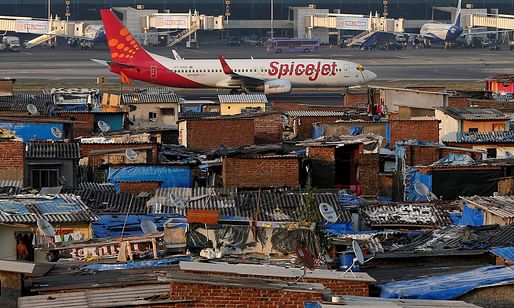 A slum area next to Mumbai airport. Photograph: Shailesh Andrade/Reuters