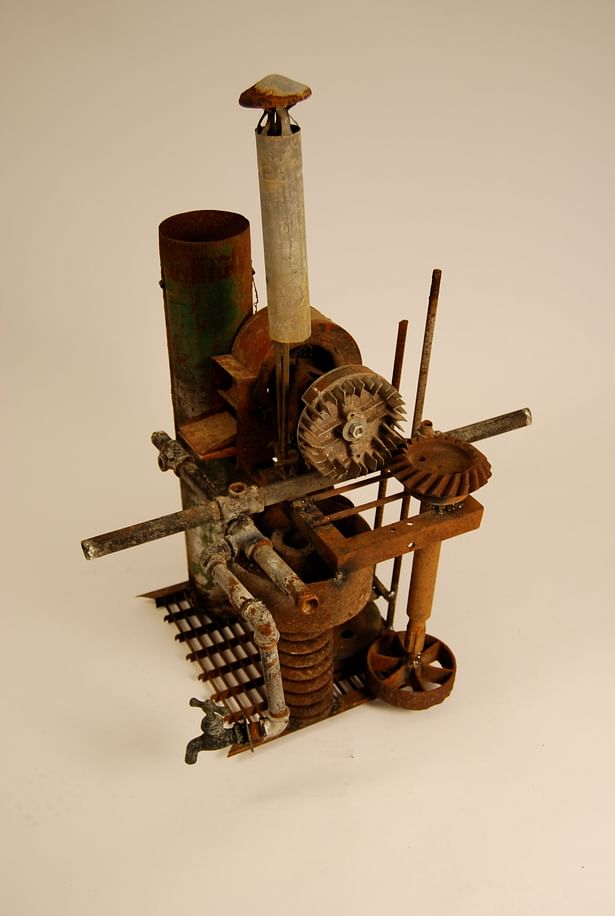 Experimental collage model of reused, welded metal parts and tubes