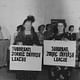 Two women hold signs which read, 'Suburban zoning defense league.' February 16, 1957. Photo courtesy of The Los Angeles Public Library.