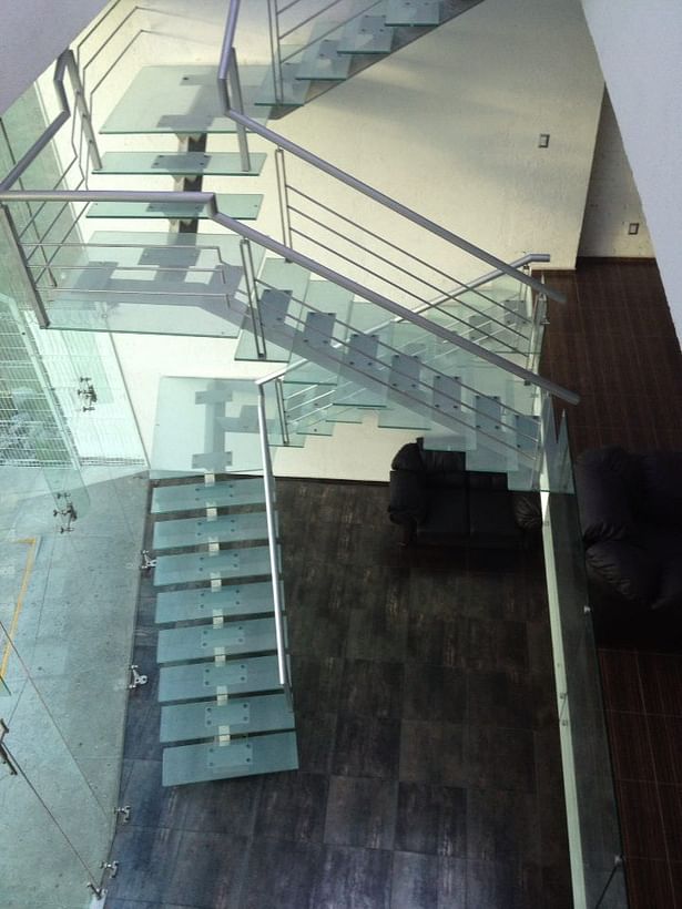 The stairs were made with steel and tempered glass. 