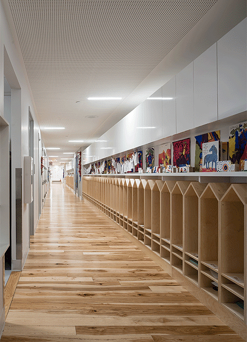 Hallways feature open concept cubbies with plenty of space for displaying books and Art.