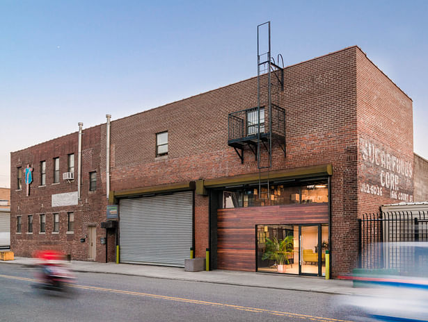 Teak wood. Transparent glass mixed facade. An inviting and more intimate business brings vibrancy into the neighborhood.