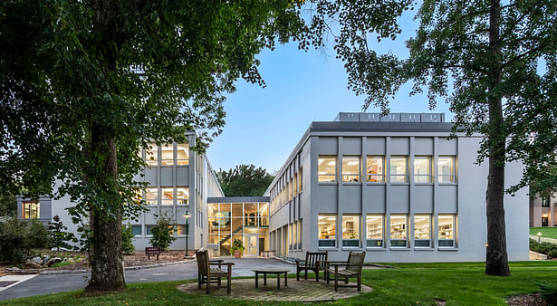 Demerec Laboratory, at Cold Spring Harbor Laboratory, with restored glass connector, historic cast-in-place concrete structures, and three-story addition. Peter Aaron/OTTO