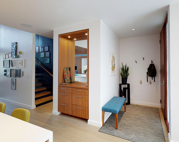 Entry with Built-In Teak Cabinetry