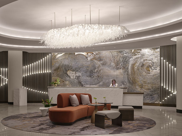 InterContinental Bellevue lobby. The reception desk has a grounding presence and conveys the strength of nature, appearing as if it were masterfully carved from a single block of stone. (photo by Will Pryce)