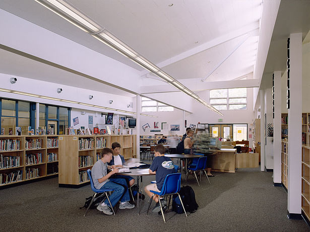 North-facing clerestories admit diffuse daylight into library.