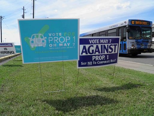 Signs about a municipal vote over fingerprint requirements for ride-hailing companies along a roadway in Austin, Tex., last week. Credit Jon Herskovitz/Reuters