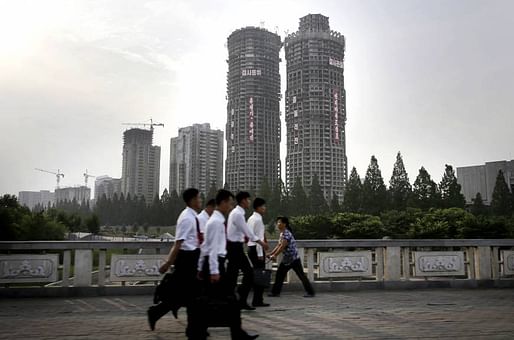 Buildings under construction on Ryomyong Street in Pyongyang. Photo via The Japan Times.