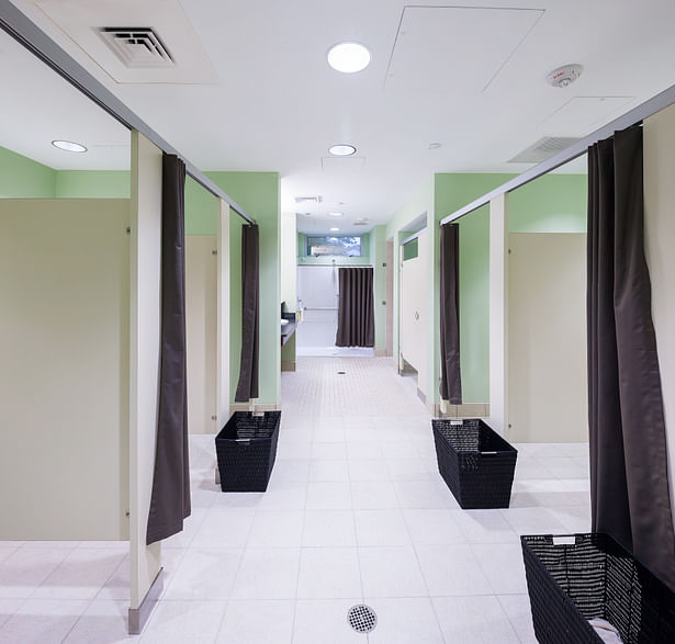 Changing rooms at the front of the Fitness Center provide residents with safe showering areas, and private changing stalls.