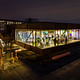 Night view of 'Overlook' lounge/event space atop the distillery. Photo by Steve Grider.