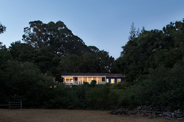 True to its name, the 6,400-square-foot, ranch-style home is surrounded by oaks on a private lot. 