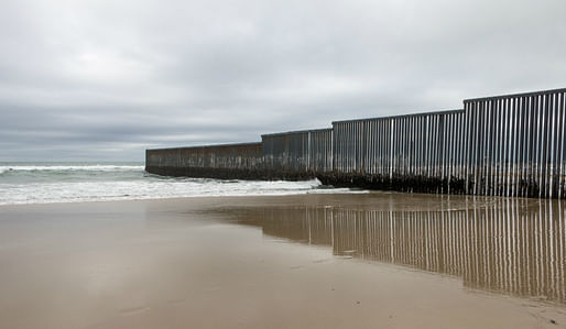 A view of the US-Mexico border fence in Tijuana, Mexico. Image courtesy of Wikimedia user © Tomas Castelazo.