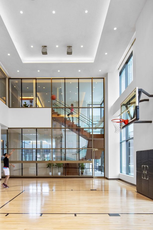 Fitness center with an indoor basketball court, Eric Laignel