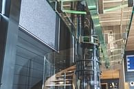Helical stairs, floating glass floor and elevator for Finland holliday home